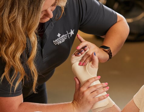 Patient in hand therapy.