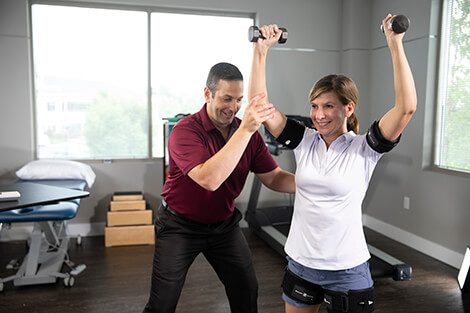 Therapist assisting exercise